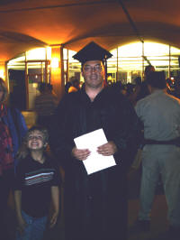 Michael with his diploma.