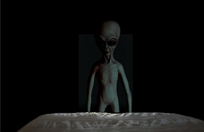 Alien standing at foot of bed.