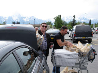 Michael and Frank load up enough food for a week.
