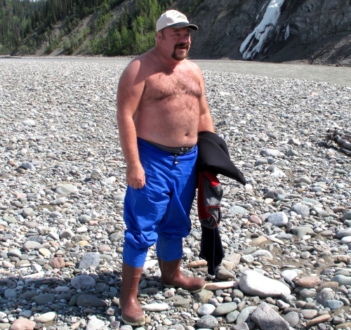Paul, shirtless in Alaska.