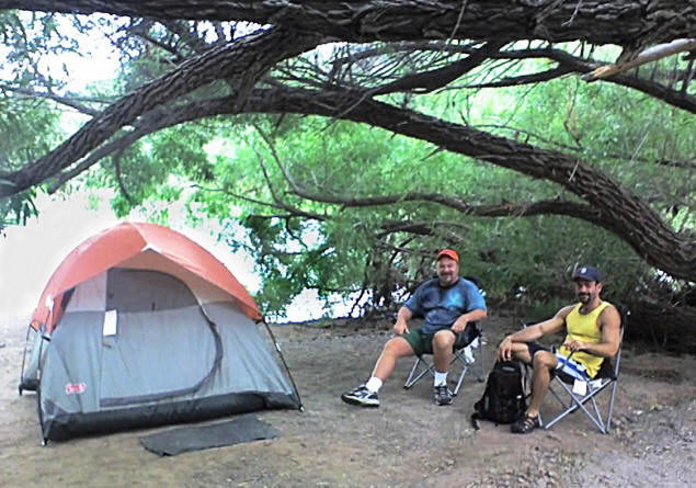 Paul and Frank in camp on the bank of the Verde River.