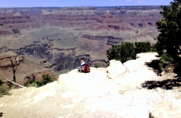 Zach contemplates the four rock types that make up the walls of Grand Canyon: Limestone, sandstone, schist and shale.