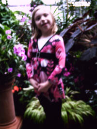 Cailey poses among the flowers.