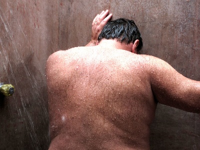 Michael taking a cold shower.