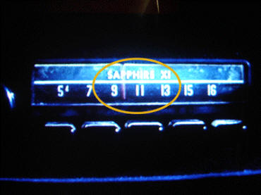 This car radio from Gremlins shows '9-11' on the dial, as well as "Sapphire" (September's birthstone) "XI" (Roman number for '11')