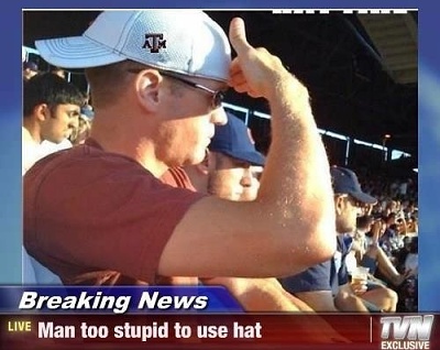 Man too stupid to use his own hat.